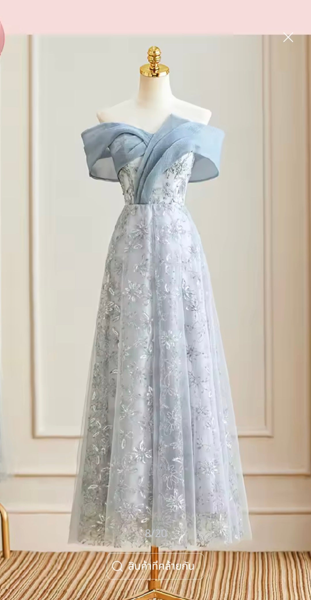 ブルーのフォールドネックのイブニングドレス