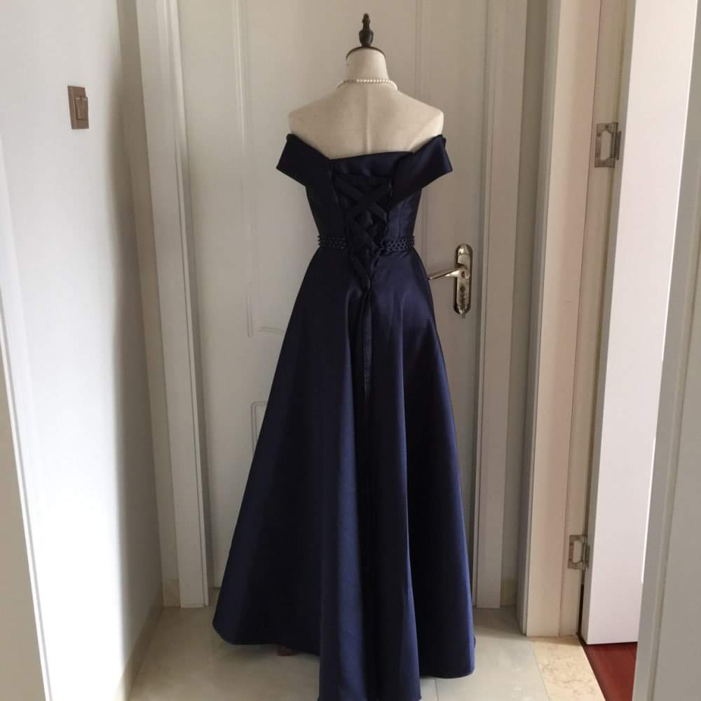 Navy blue off-shoulder long dress with a bow at the waist