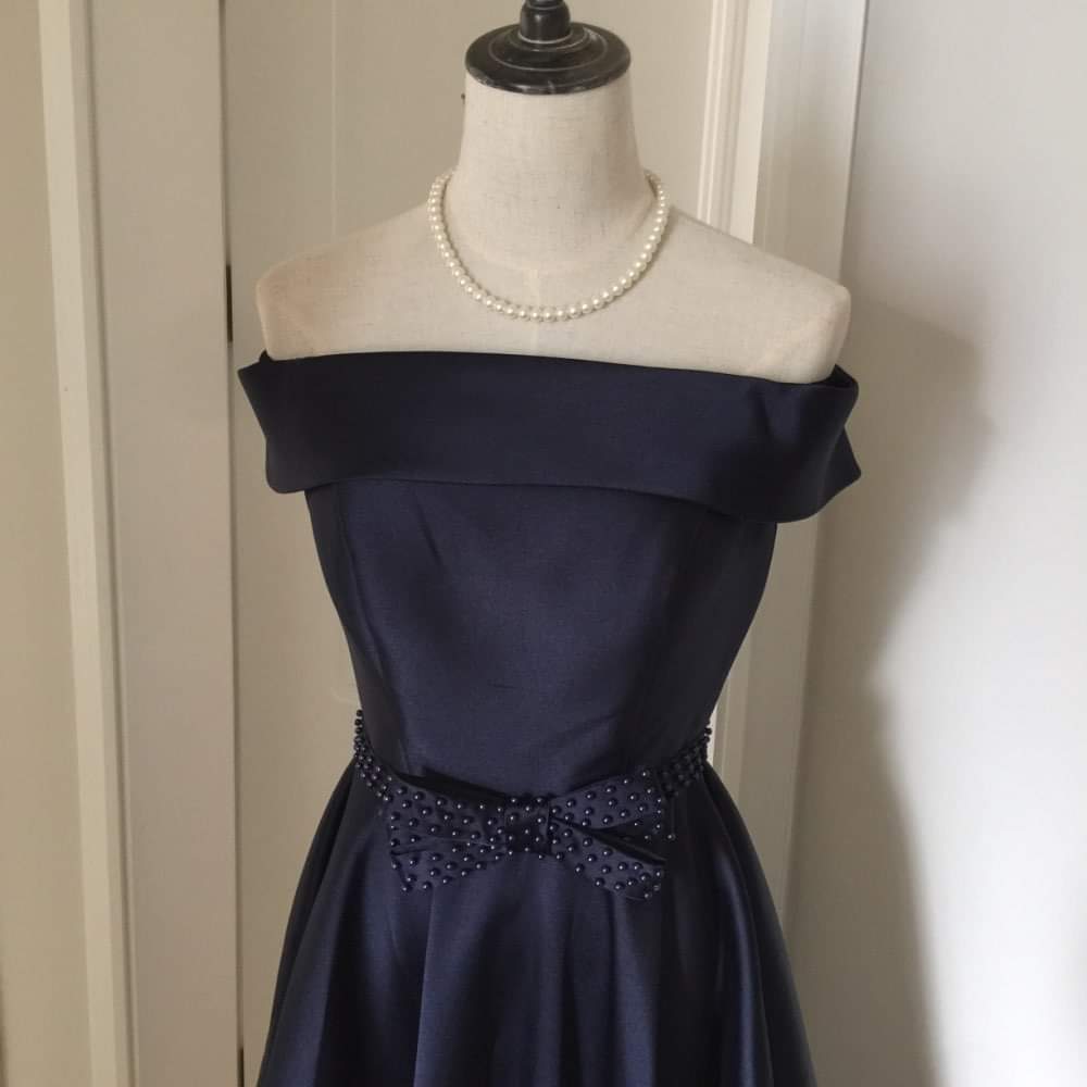 Navy blue off-shoulder long dress with a bow at the waist