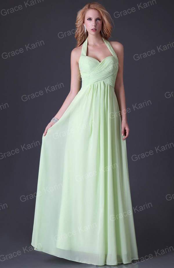 Pastel green long evening dress with a crisscross front, simple and elegant.
