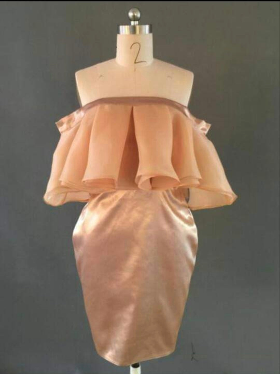เดรสระบายเปิดไหล่สีพีช / Peach Ruffled Off-Shoulder Dress