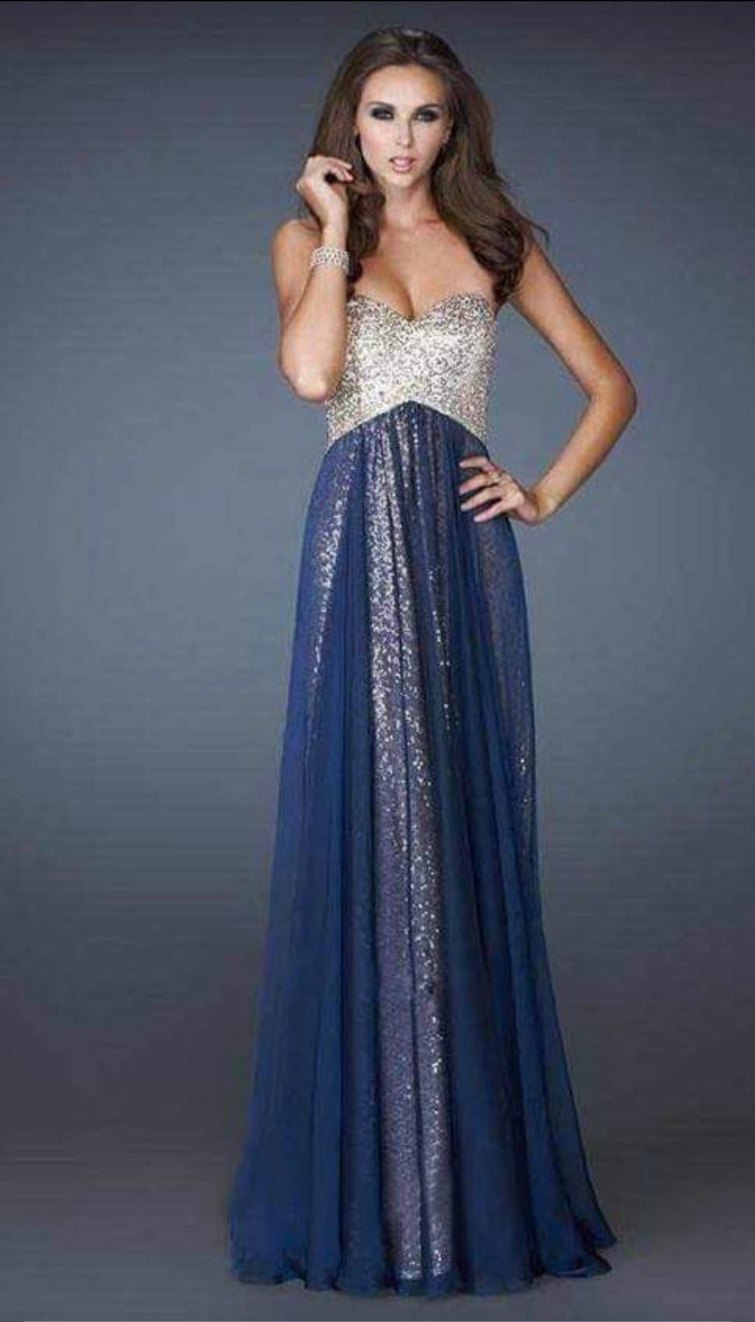 Strapless long evening dress with gold glitter and blue trim, luxurious design
