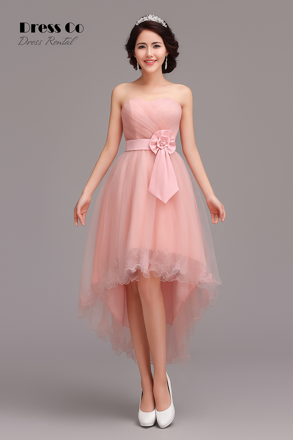 เดรสเกาะอกสีชมพู หน้าสั้นหลังยาว ตกแต่งโบว์เอว/Pink Strapless High-Low Dress with Waist Bow